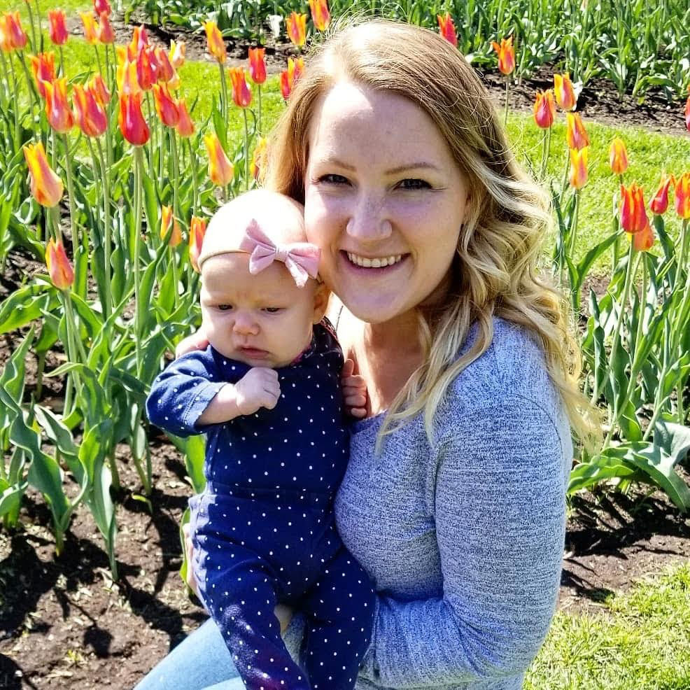 Kaleigh Van Middendorp holds her daughter